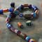 12 Pack: Multicolor Geo Print Lamp Work Glass Mixed Beads by Bead Landing®